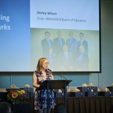 Chair Wilson speaking on stage